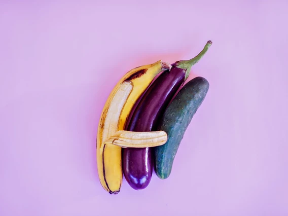 A banana, an eggplant and a cucumber