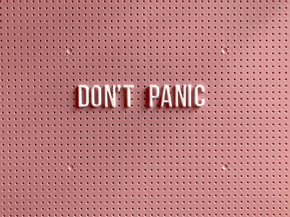 A meme that says Don't Panic